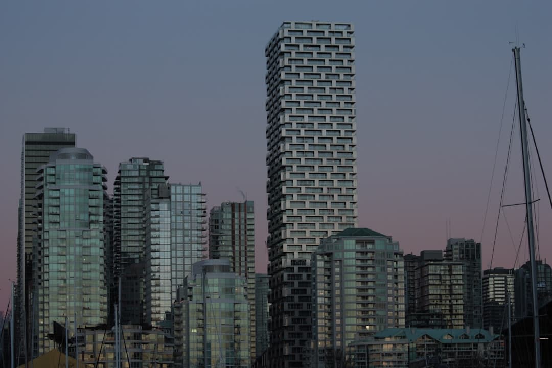 A Vancouver condo tower at dusk.