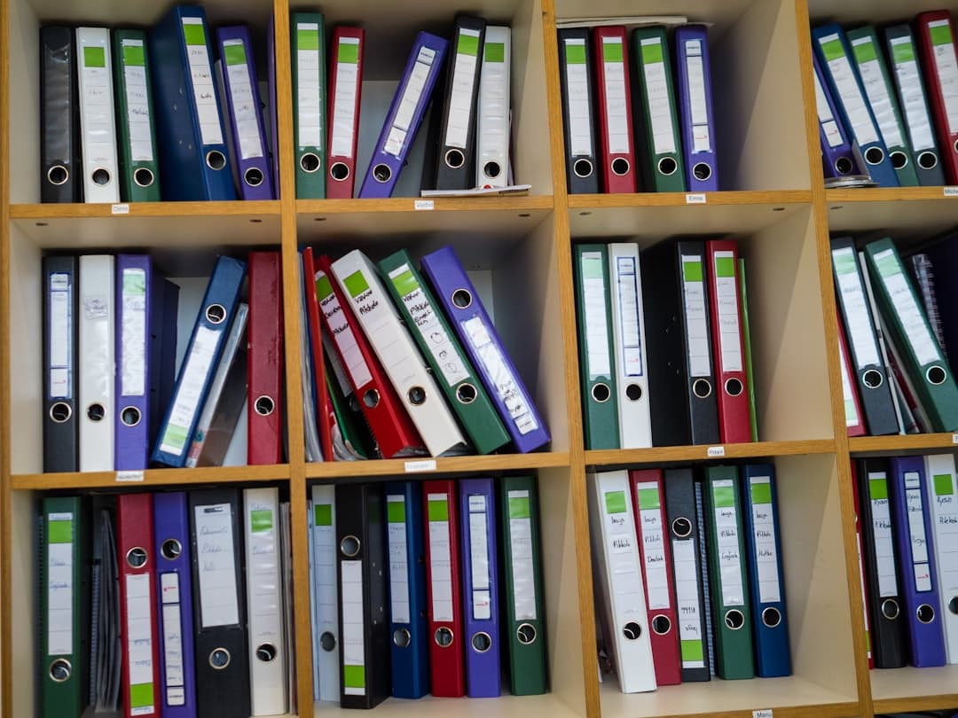 Archived folders on a shelf.